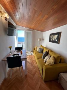 Khu vực ghế ngồi tại Apartments Emilija