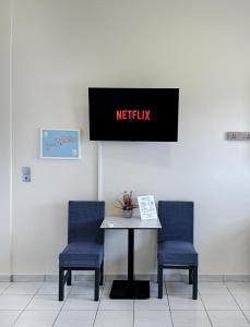 TV a/nebo společenská místnost v ubytování Mammis Studios