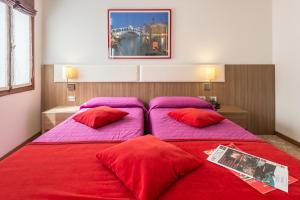 Posteľ alebo postele v izbe v ubytovaní Hotel Il Moro di Venezia