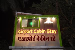 ムンバイにあるAirport Cabin Stay Mumbai Near T2の空港キャビンでの宿泊の際の表示