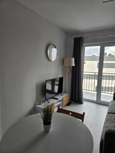 Postel nebo postele na pokoji v ubytování Apartament - Osiedle Przylesie