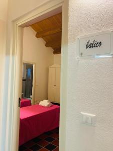 Voodi või voodid majutusasutuse Tre Balate Natura e Relax toas