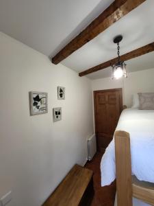 Postel nebo postele na pokoji v ubytování El Refugio de Gredos