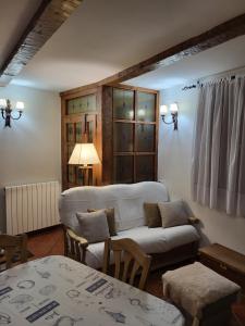 Postel nebo postele na pokoji v ubytování El Refugio de Gredos