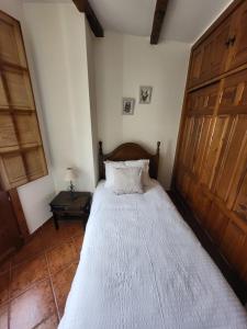 Postel nebo postele na pokoji v ubytování El Refugio de Gredos