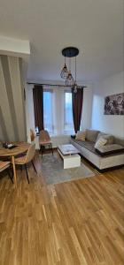 Khu vực ghế ngồi tại DM apartman Divcibare