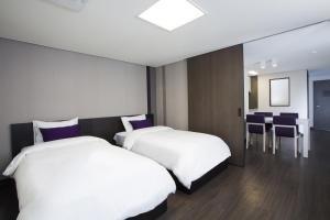Postel nebo postele na pokoji v ubytování Hanwha Resort Yongin Besancon + 37 fotografií