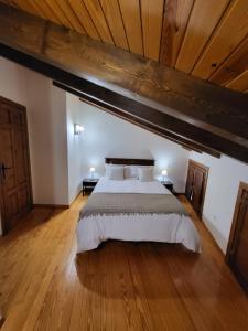Postel nebo postele na pokoji v ubytování El Refugio de Gredos
