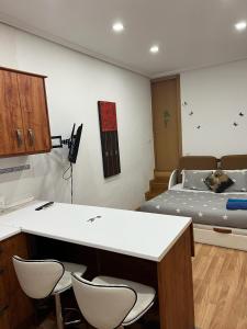 A kitchen or kitchenette at Estudio Nueva Numancia