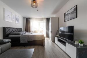 Μια τηλεόραση ή/και κέντρο ψυχαγωγίας στο Direkter Thermenzugang & Golfresort