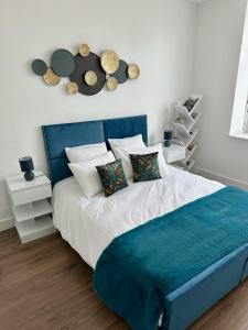 Кровать или кровати в номере Le rêve Bleu