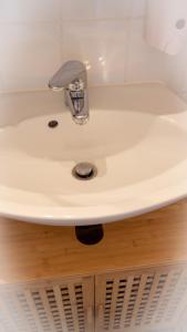 a sink in a kitchen with ailver at CENTRAL Apartment Hannover - Good & calm location - Contactless Check-in in Hannover
