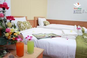 Katil atau katil-katil dalam bilik di Boom Forest Hotel