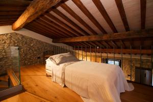 Ένα ή περισσότερα κρεβάτια σε δωμάτιο στο Agriturismo iOlive Tuscany appartamento LECCINO +9 φωτογραφίες