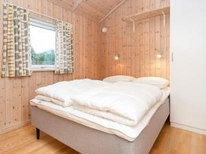 Postel nebo postele na pokoji v ubytování Holiday Home Kirsebærvænget III