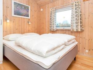 Postel nebo postele na pokoji v ubytování Holiday Home Kirsebærvænget III