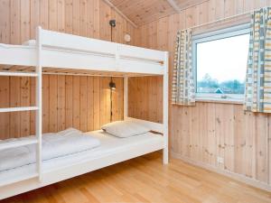 Postel nebo postele na pokoji v ubytování Holiday Home Kirsebærvænget III