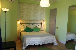 Postel nebo postele na pokoji v ubytování Axia Terme B&B, 4 min dal Centro Storico - PARK privato