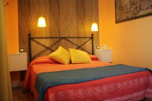 Postel nebo postele na pokoji v ubytování Axia Terme B&B, 4 min dal Centro Storico - PARK privato