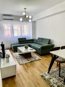 Et opholdsområde på Tuse Lux apartments