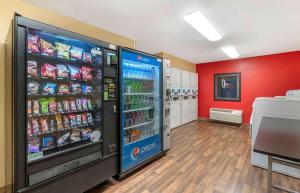 a store with a soda vending machine in a room at Extended Stay America Suites - Hampton - Coliseum in Hampton