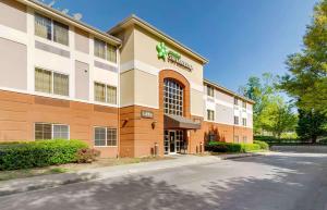 a rendering of the front of a hotel at Extended Stay America Select Suites - Atlanta - Perimeter - Peachtree Dunwoody in Atlanta