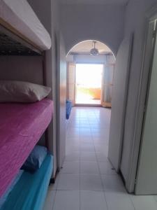 a hallway with two bunk beds in a room at Estudio naturista 1 in Vera +7 photos
