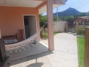 Zahrada ubytování Confortável quarto em Matinhos