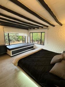 Posezení v ubytování Luxury Finca el Ensueño, casa entera, con Sauna, Jacuzzi, BBQ y Caballos
