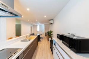 Una cocina o cocineta en The Onyx Tomakomai