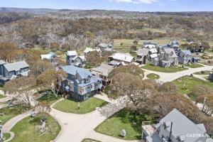 an aerial view of a large estate with houses at Mayfair in Dinner Plain