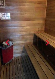a sauna with a bench and a trash can at Mountain Edge in Kimberley