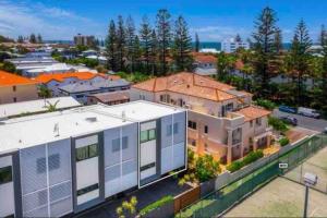 an aerial view of a house in a suburb at Casa De Mork - Entire 3 Storey Beach Villa in Gold Coast