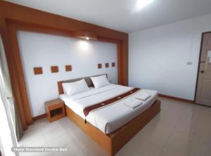 Areena Resort and Hotel Uttaradit客房内的一张或多张床位