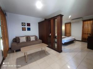 Areena Resort and Hotel Uttaradit客房内的一张或多张床位