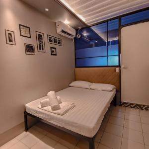 Postel nebo postele na pokoji v ubytování Hotel Snow Angeles