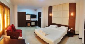 Areena Resort and Hotel Uttaradit客房内的一张或多张床位