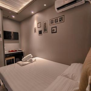 TV a/nebo společenská místnost v ubytování Hotel Snow Angeles