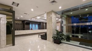 Lobbyn eller receptionsområdet på Grand Zuri Pematangsiantar