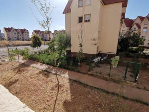 a garden in front of a house at Maison de vacances in Ifrane