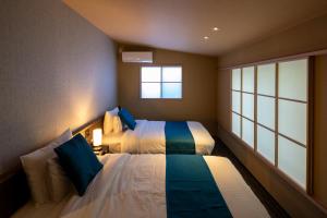 Hotel Sengokuhara 533客房内的一张或多张床位