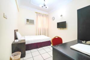 Katil atau katil-katil dalam bilik di OYO 124 Al Salam Palace Hotel