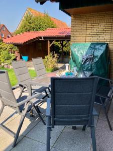 Αίθριο ή υπαίθριος χώρος στο Ferienhaus Dünenwind in Carolinensiel,W-Lan,Strandkorb