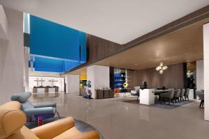 Posezení v ubytování Hampton by Hilton Guangzhou Luoxi
