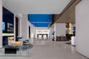 Posezení v ubytování Hampton by Hilton Guangzhou Luoxi