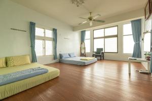Giường trong phòng chung tại Jinshawan B&B