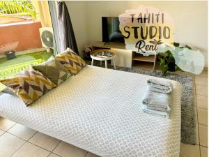 Voodi või voodid majutusasutuse Studio Kaoha Nui - Private apartment toas