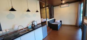Una cocina o kitchenette en Gopeng Riverstones Rainforest Retreat