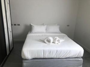 A bed or beds in a room at ฺBKK @ Khaolak