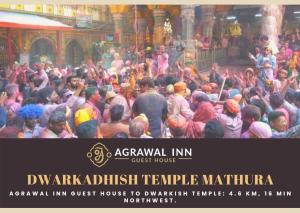 a large crowd of people standing in a temple at Agrawal Inn Guest House in Mathura